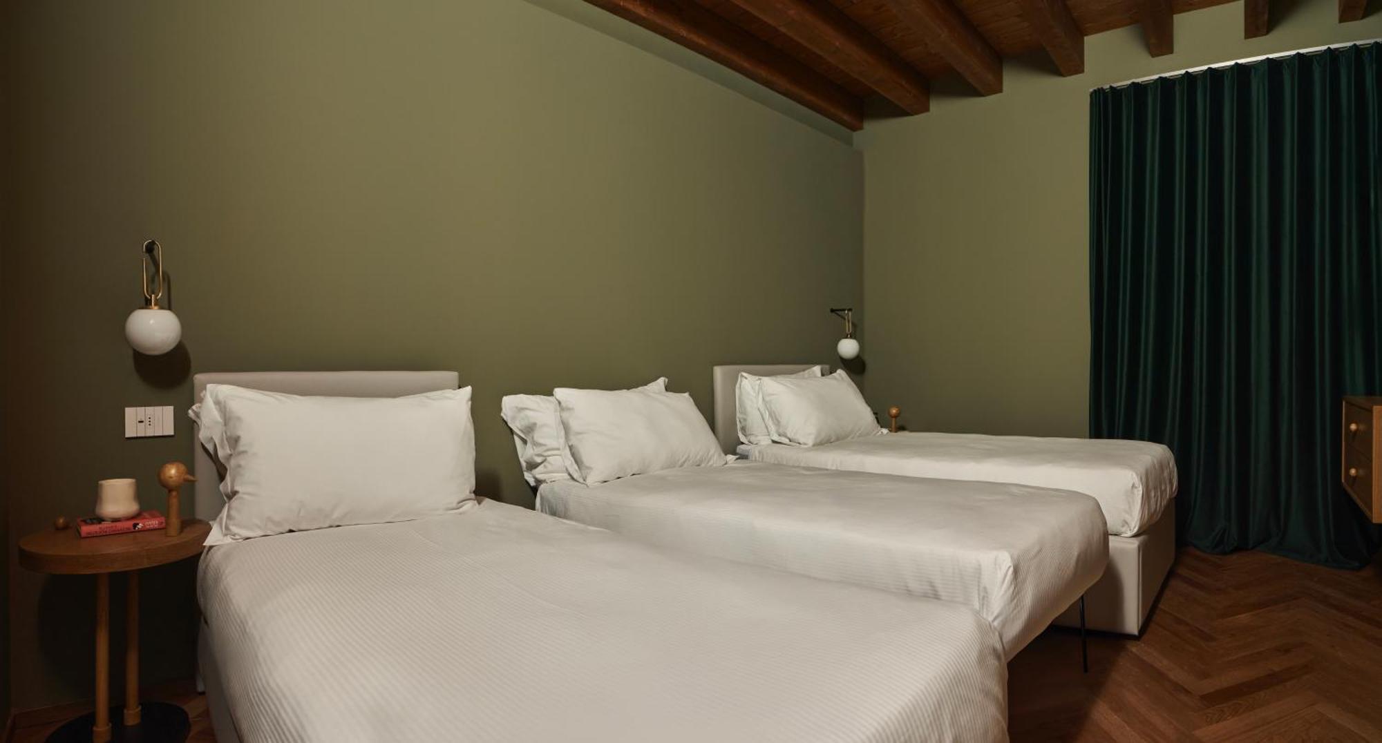 Rego Apartments - Boutique Aparthotel & Serenity Spa With Some Off-Site Apartments In The Heart Of Bergamo City Center Номер фото
